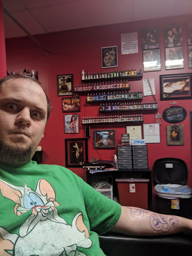 Explore tattoo ideas on tricep, creative tattoo ideas in Boaz, available at Skin Deep Tattoo & Piercing Studio