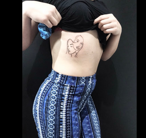 Explore newborn tattoo ideas for mom, creative tattoo ideas in Scarsdale, available at Damm Nice Tattoo & Body Art