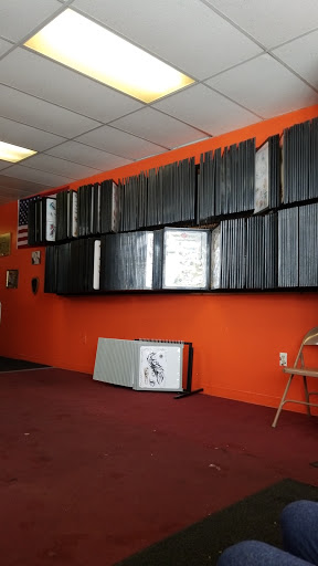 Explore pistol tattoo ideas, creative tattoo ideas in Warren, available at Fat Cats Tattoos