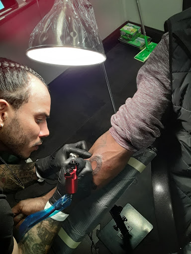 Explore tattoo ideas for hands and wrists, creative tattoo ideas in Hudson, available at The Ink Club Tattoo Studio