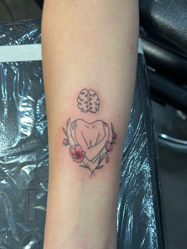 Explore marathon tattoo ideas for guys, creative tattoo ideas in Bloomington, available at Crimson Breed Tattoo Studio