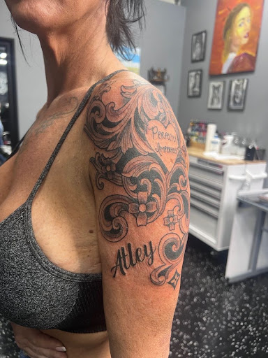 Explore cherry blossom tree tattoo ideas, creative tattoo ideas in Fort Myers, available at Loyal 2 The Coil Tattoos & Piercings (Edison Mall Location Entrance F)