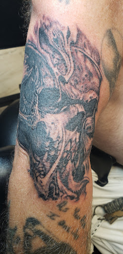 Explore 2002 tattoo ideas, creative tattoo ideas in Toledo, available at Artistik Tat2 and Body Piercing