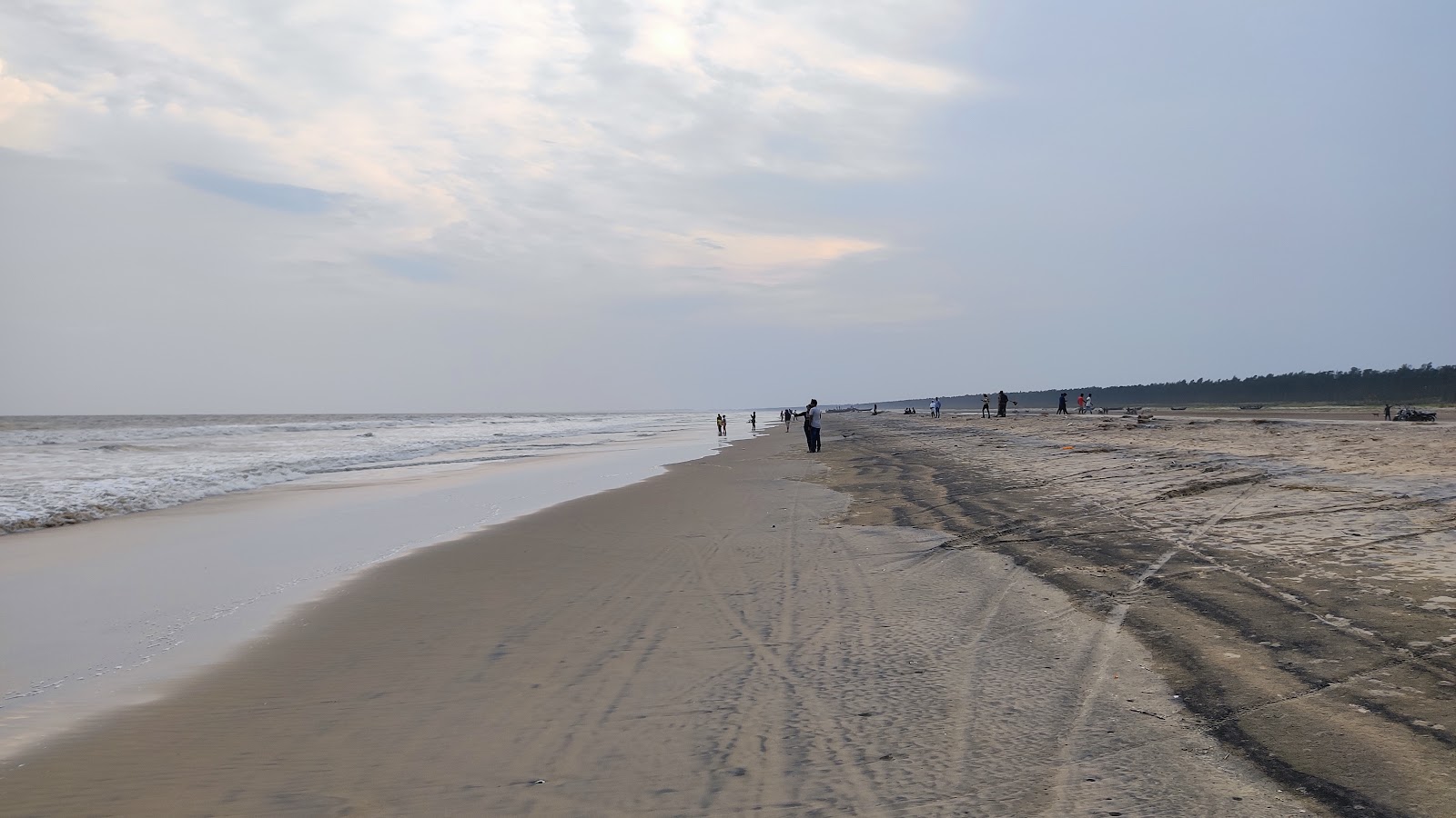 Fotografija Dagara Sea Beach z svetel pesek površino