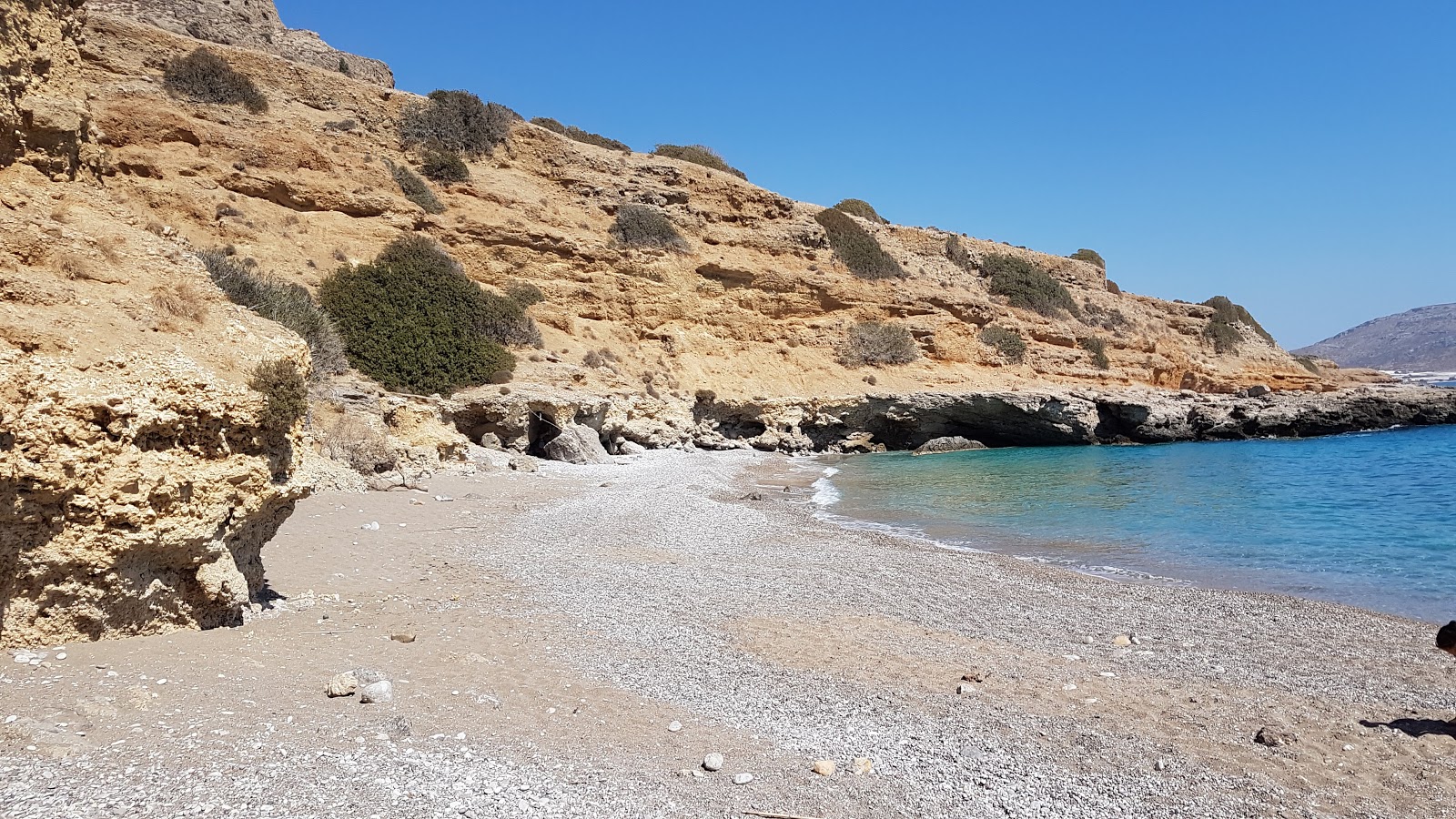 Foto av Kalami beach med grå fin sten yta