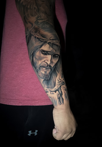 Explore archangel michael tattoo ideas, creative tattoo ideas in Silver City, available at Independent Ink Tattoo