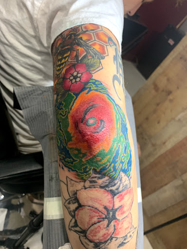 Explore tribal wolf tattoo ideas, creative tattoo ideas in Cape Coral, available at UNRIVALED INK