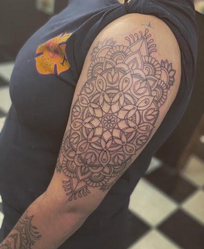 Explore cool small face tattoo ideas, creative tattoo ideas in Stevens Point, available at Black Rabbit Tattooing