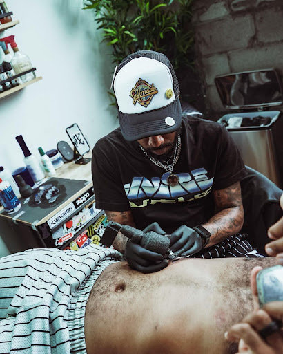 Explore name tattoo ideas for men, creative tattoo ideas in Hilliard, available at 22 Caliber Tattoo Mega Studio