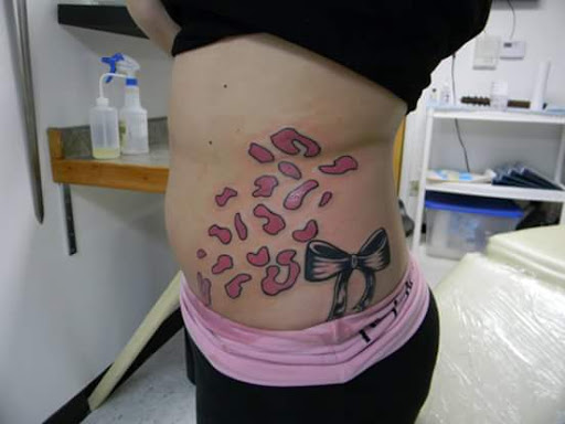 Explore women's tattoo ideas, creative tattoo ideas in Rockford, available at House Of Pain Tattoo co.