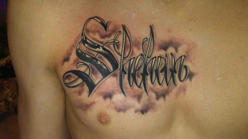 Explore hand mens tattoo ideas, creative tattoo ideas in Stuart, available at Urban Inkers Tattoos