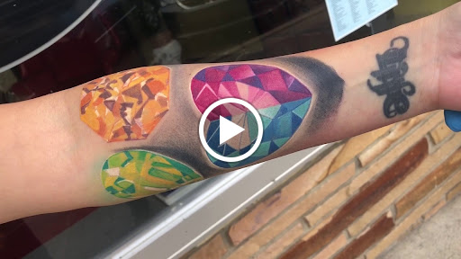 Explore face tattoo ideas female, creative tattoo ideas in Junction City, available at Junction City Tattoo