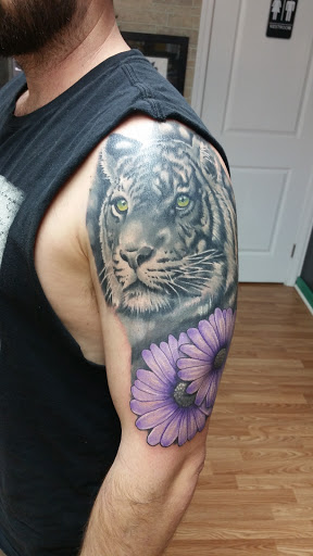 Explore cover up tattoo ideas for shoulder, creative tattoo ideas in Syracuse, available at Oculus Tattoo Lounge