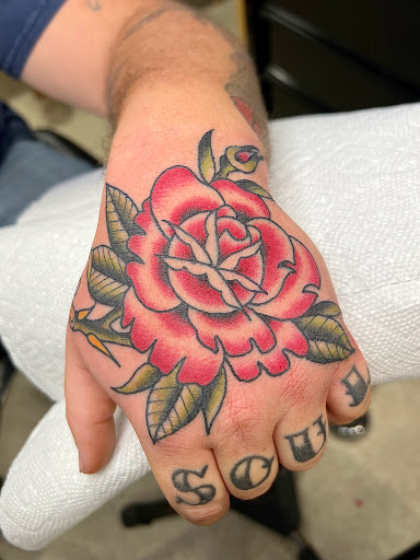 Explore small flowers tattoo ideas, creative tattoo ideas in Elkin, available at Black Bear Tattoo