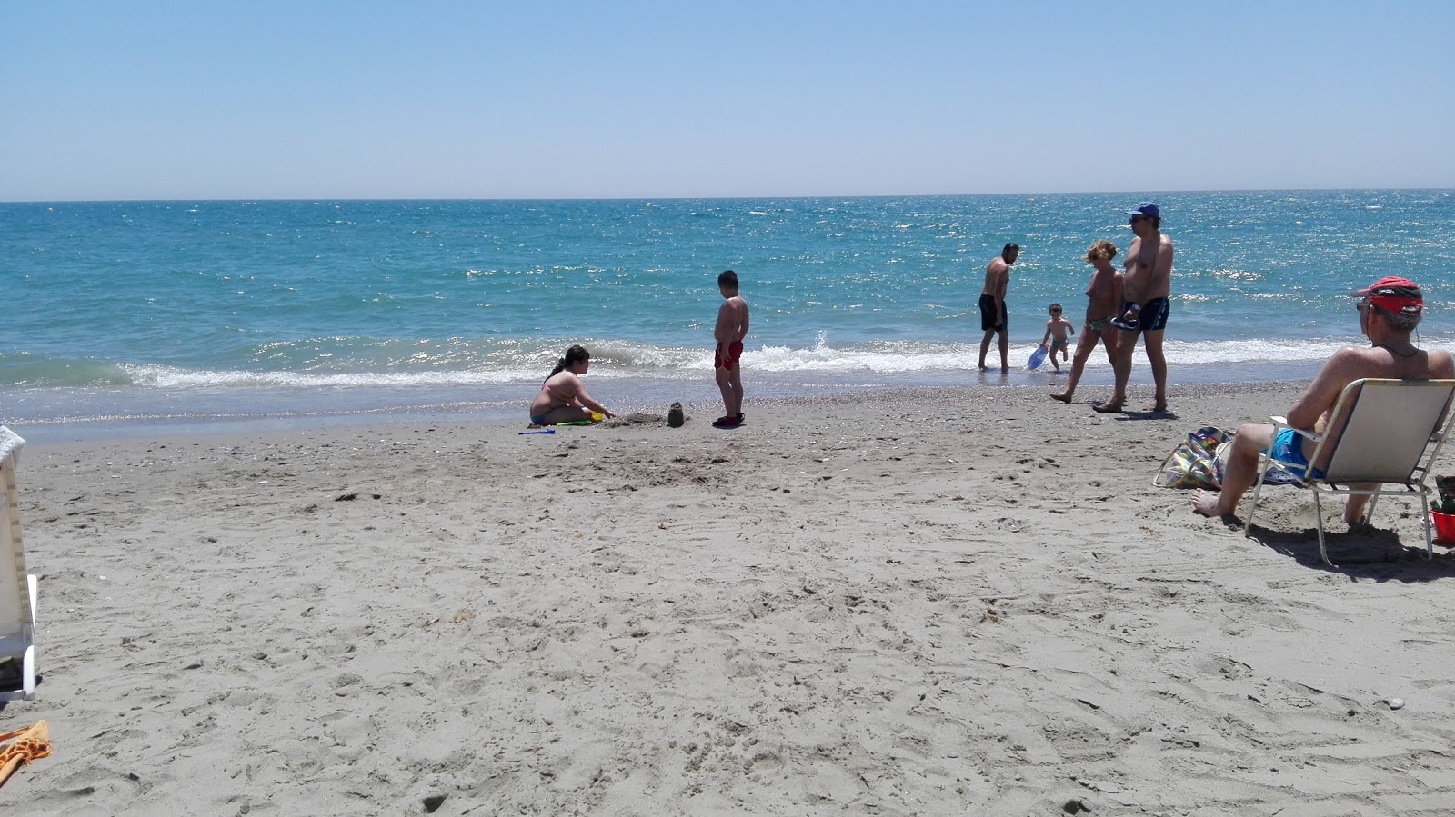 Photo of Playa de Quitapellejos and the settlement