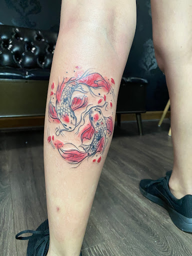 Explore gun tattoo ideas for men, creative tattoo ideas in Sanford, available at Hudson & Company Tattoo Studio