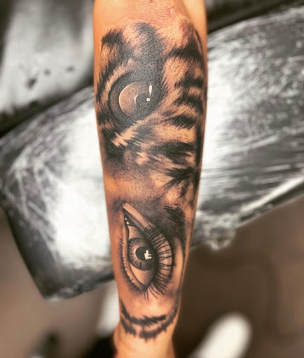 Explore cover up tattoo ideas for names, creative tattoo ideas in Cincinnati, available at Soul Rage Tattoo