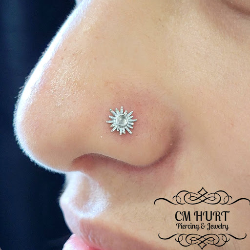 Find under breast tattoo ideas for your next unique tattoo in Garden Grove at CM Hurt Piercing & Jewelry