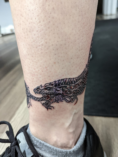 Explore neck tattoos ideas, creative tattoo ideas in Saint Paul, available at No Joke Tattoo Studios