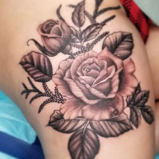 Find under the breast tattoo ideas for your next unique tattoo in Bakersfield at Bakersfield Tattoo & Piercing