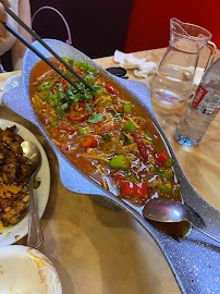 Plats et boissons du Restaurant chinois 李子坝梁山鸡LiZiBa ChongQing Chicken Pot à Paris - n°11