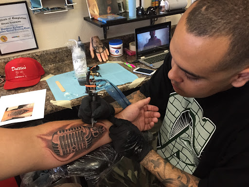 Explore february birth flower tattoo ideas, creative tattoo ideas in Garden Grove, available at Dr. Tattoo Studio