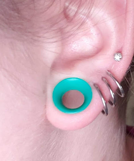 Explore birthstone tattoo ideas, creative tattoo ideas in Laramie, available at Deviant Piercings and Tattoo