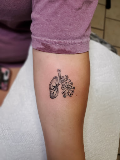 Explore alchemist tattoo ideas, creative tattoo ideas in Stamford, available at KE Tattoo Studio