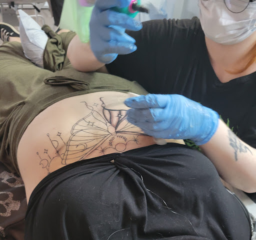 Explore wing tattoo ideas, creative tattoo ideas in Lawrenceville, available at Steele Ink Studios Body Art