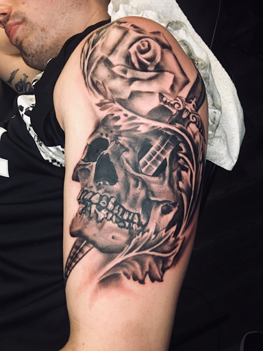 Explore music tattoos ideas, creative tattoo ideas in Warner Robins, available at Untold Pain Tattoo Studio