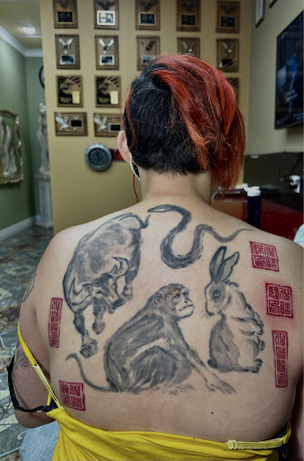 Find tattoo ideas between breast for your next unique tattoo in Sunnyvale at Da Wei Tattoo Inc