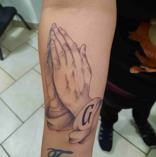Explore tattoo ideas for covering up name, creative tattoo ideas in Espanola, available at Daydreamer Tattoo