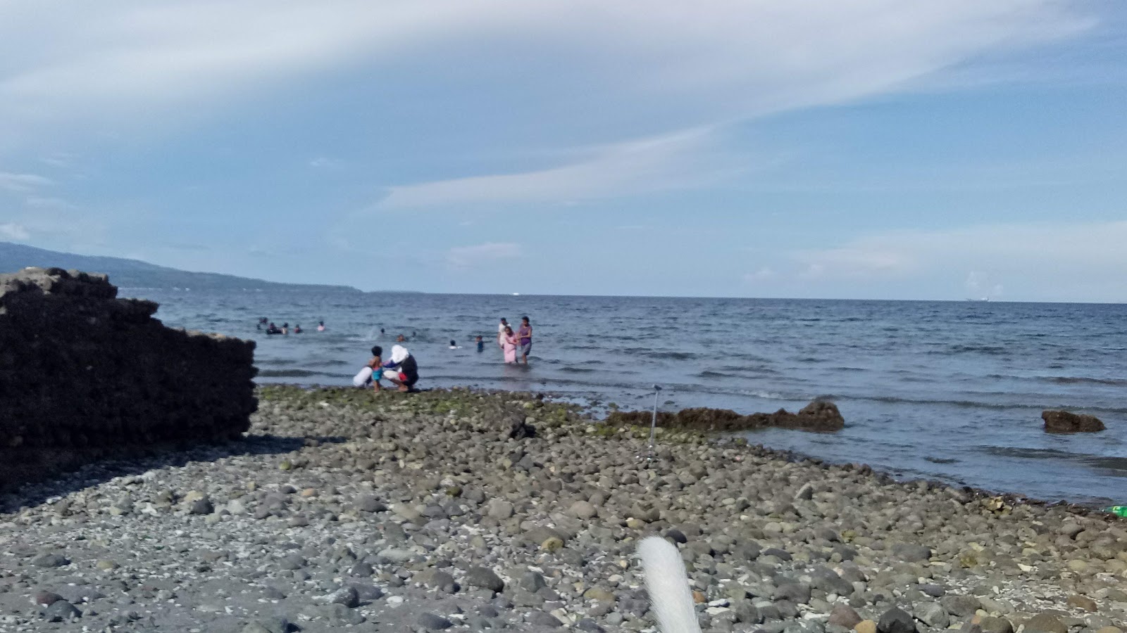 Foto av Ajong Beach och bosättningen