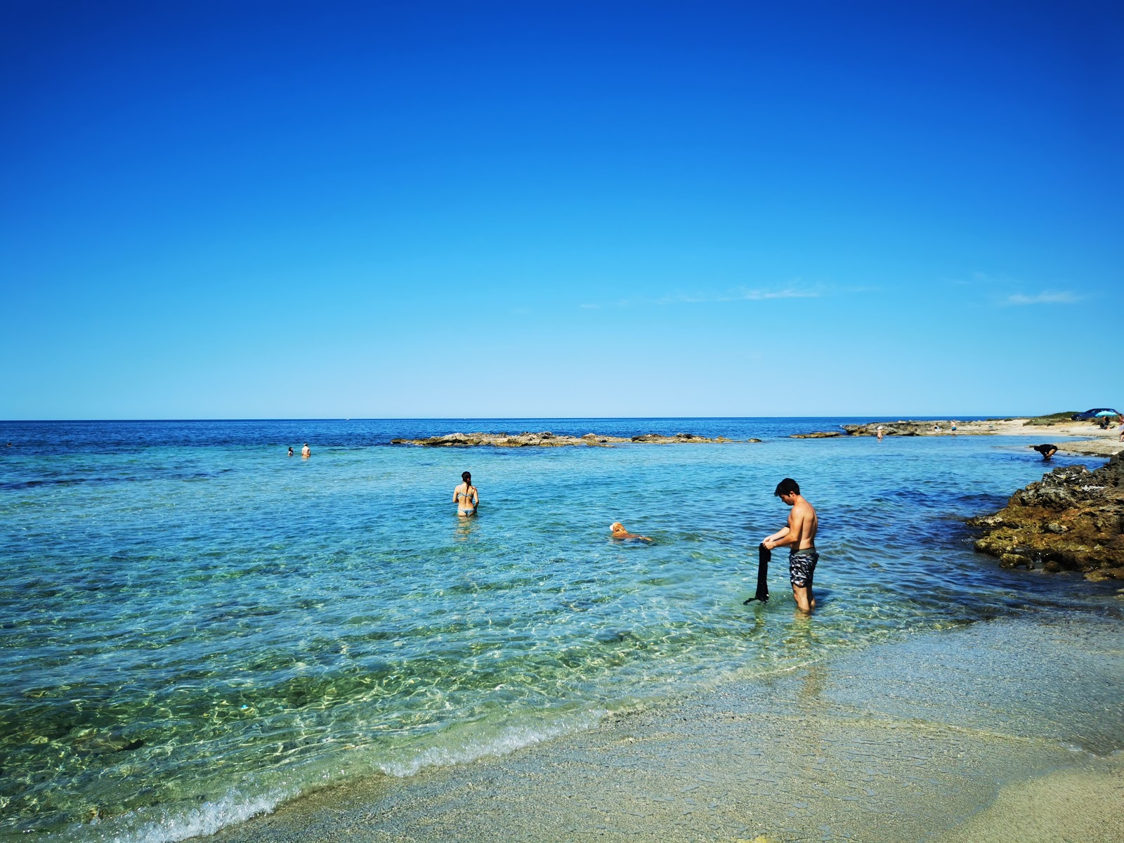 Foto von Spiaggia calette di salve mit teilweise sauber Sauberkeitsgrad