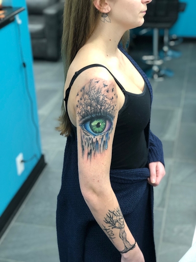 Explore chest to arm tattoo ideas, creative tattoo ideas in Lockport, available at Archer Ink Tattoo
