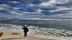Foto av Cactus Beach omgiven av berg