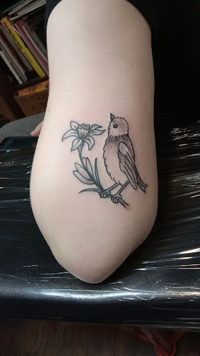 Explore dragon head tattoo ideas, creative tattoo ideas in Seattle, available at Good Times Tattoo