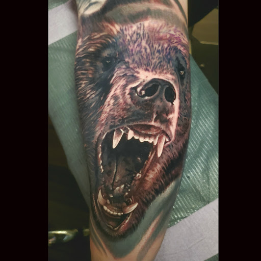 Explore religious tattoo sleeve ideas, creative tattoo ideas in Wasilla, available at Twin Ravens Tattoo