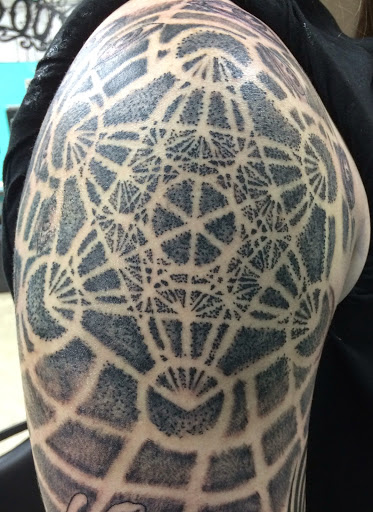 Explore dark tattoo cover up ideas, creative tattoo ideas in New Orleans, available at Mid City Voodoux Tattoos