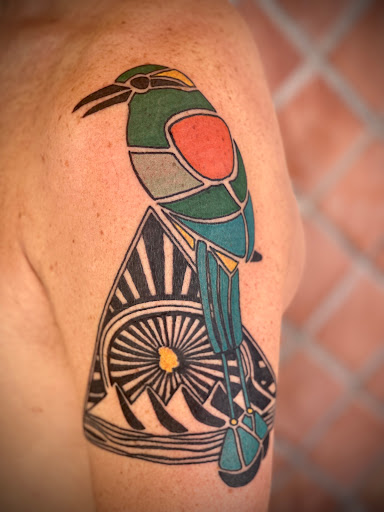 Explore magician tattoo ideas, creative tattoo ideas in Stuart, available at Tiger Shark Tattoo Studio