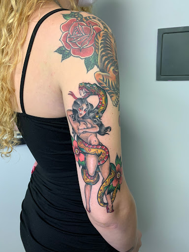 Explore purple heart tattoo ideas, creative tattoo ideas in Jersey City, available at Blue Bird Tattoo Gallery Jersey City, NJ