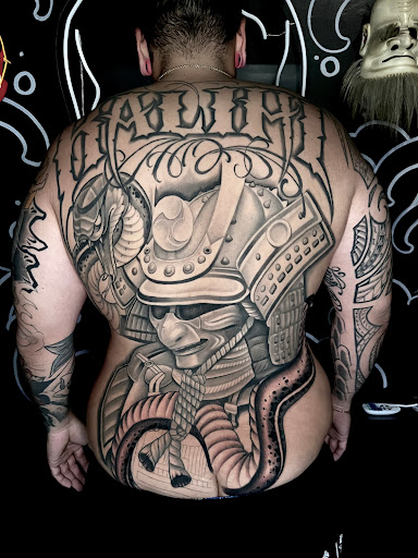 Explore neck tattoos for women ideas, creative tattoo ideas in Honolulu, available at Sacred Art Tattoo Waikiki