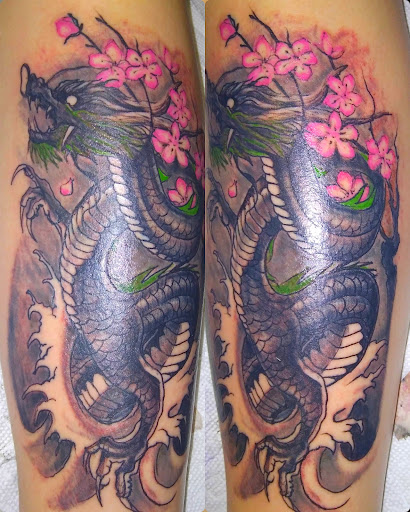 Find earth tattoo ideas for your next unique tattoo in Roanoke at RailYard INK