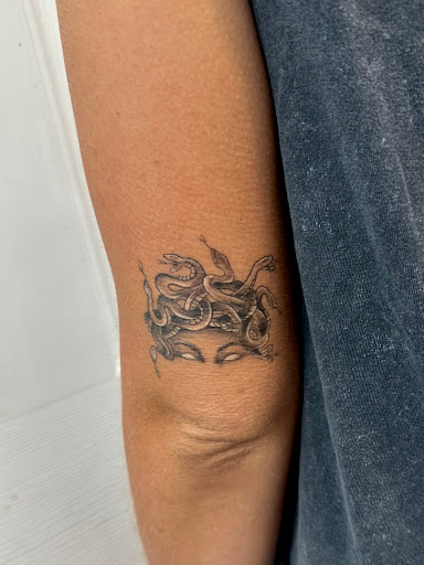 Explore face tattoo ideas for men, creative tattoo ideas in Bradenton, available at Classic Ink Tattoo Studio