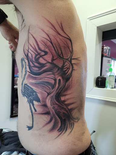 Explore michigan tattoo ideas, creative tattoo ideas in Angola, available at Hoodlum Ink