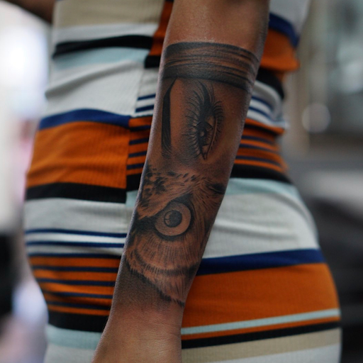 Explore red and black tattoo ideas, creative tattoo ideas in Las Vegas, available at 70Duece Tattoos