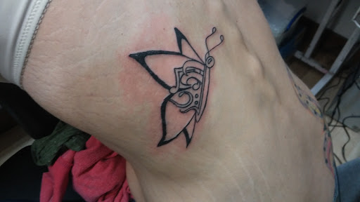 Explore rapper tattoos ideas, creative tattoo ideas in Hempstead, available at Murda Ink Tattoos