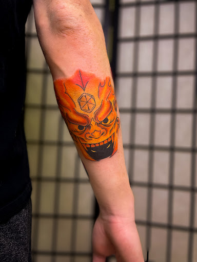 Explore tattoo ideas for musicians, creative tattoo ideas in Cedar Falls, available at Omega Red Piercing & Tattoo