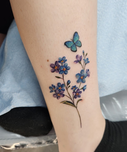 Explore small thigh tattoo ideas, creative tattoo ideas in Loganville, available at Blue Siren Tattoos