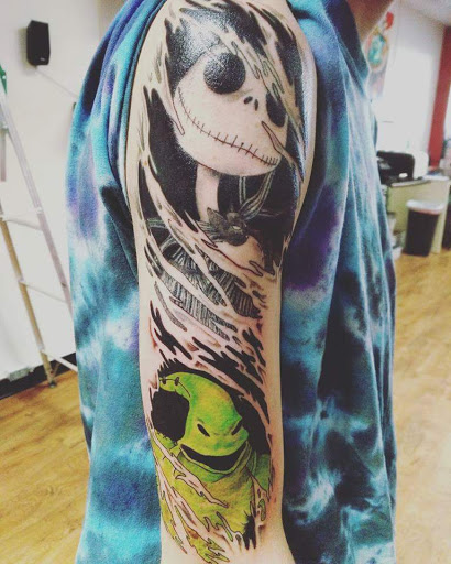 Explore tattoo behind ear ideas, creative tattoo ideas in Akron, available at Knuckle Up Ink Tattoos